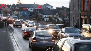 Paramedics treat elderly woman and man after double car collision in Limerick city