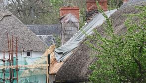 New thatch nears completion on burnt Adare cottage
