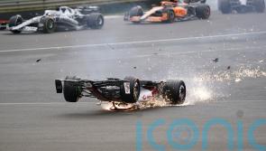Zhou Guanyu escapes major injury after ‘horrific’ first-lap crash at Silverstone