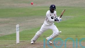 Surrey face battle to save perfect start to title defence as Kent build big lead