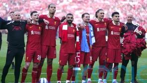 Liverpool secure Premier League title with crushing win against Tottenham
