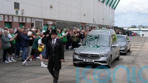 Fans applaud as Sir Tom Farmer&rsquo;s hearse passes Easter Road