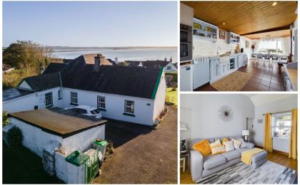Escape to coastal cottage with sprawling gardens and stunning views for shy of €500k