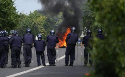 Garda hospitalised and man (20s) arrested at Coolock protest as rocks and bricks thrown