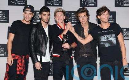Louis Tomlinson hints at One Direction reunion