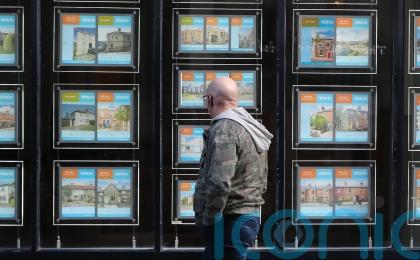 Rate of house price inflation halves as buyers become more cautious, poll finds
