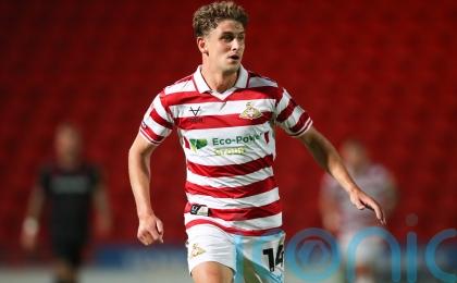 Doncaster deny former boss Richie Wellens with Harrison Biggins header