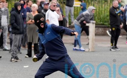 Harris condemns violent scenes as gardai attacked at anti-immigration protest