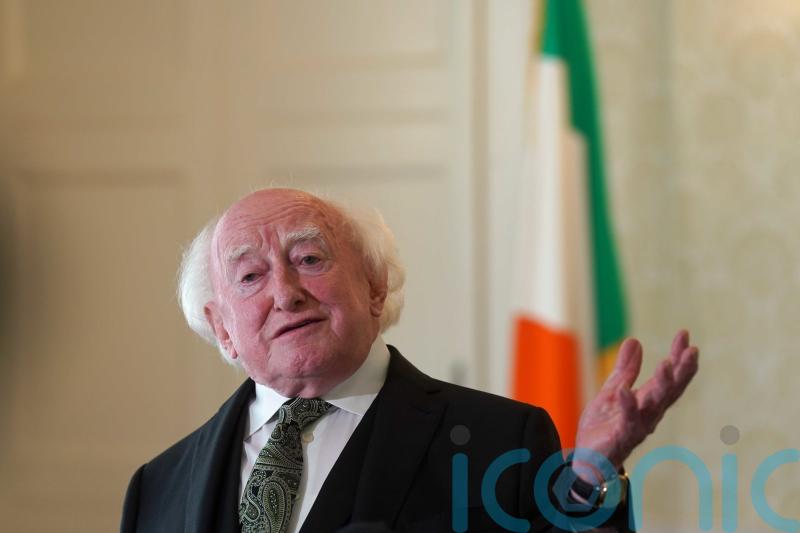 President Higgins enjoys Derry City match despite security alert disruption