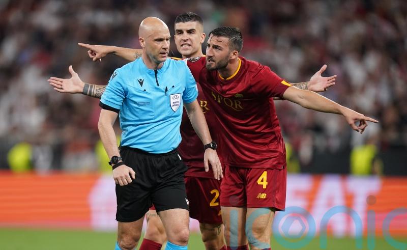 Referees’ chiefs condemn ‘abhorrent’ abuse of Anthony Taylor at Budapest Airport