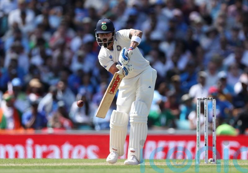 Battling Virat Kohli keeps Australia’s victory charge at bay