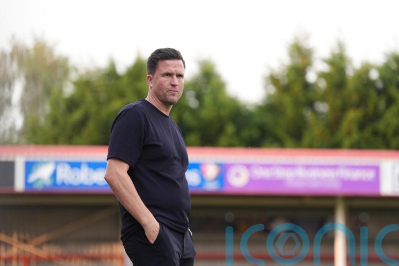 Gary Caldwell hails Exeter’s character after smash-and-grab win at Lincoln